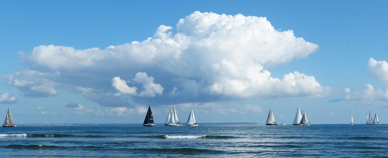 Sail boats on the horizon